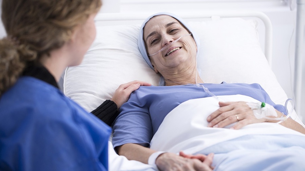Healthcare professionals assisting a patient